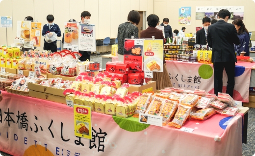 ②県産品の販売会の実施